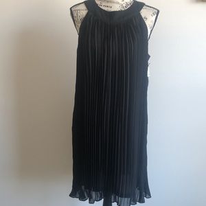 Romeo & Juliet Couture black pleated dress Size Medium, New with tags